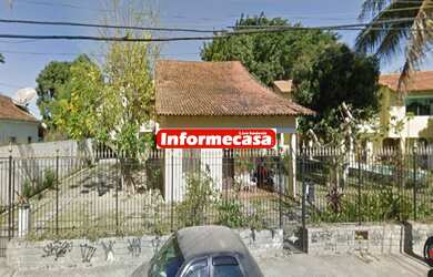 Imagem: A casa possui 2 Dormitórios, 3 Vagas na garagem e está localizado