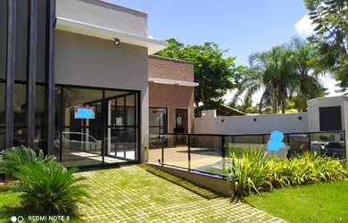 Imagem: A casa em condomínio possui 4 Dormitórios, 4 Suítes, 5 Banheiros