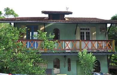 Imagem: A casa possui 2 Dormitórios, 1 Banheiro, 6 Vagas na garagem