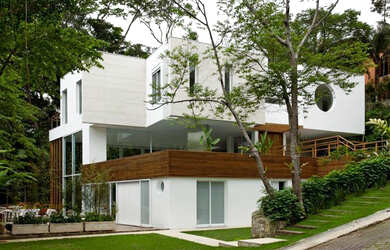 Imagem: A casa em condomínio possui 5 Dormitórios, 5 Suítes e 600m²