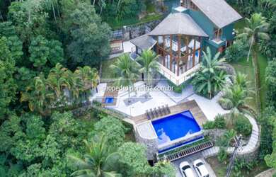 Imagem: A casa em condomínio possui 6 Dormitórios, 5 Suítes, 7 Banheiros