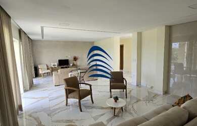 Imagem: A casa possui 6 Dormitórios, 5 Suítes, 7 Banheiros, 4 Vagas