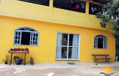 Imagem: A casa possui 3 Dormitórios, 1 Banheiro, 1 Vaga na garagem