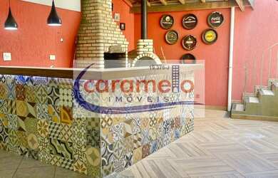 Imagem: A casa à venda possui 2 Dormitórios, 2 Suítes, 4 Banheiros