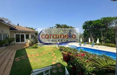 Imagem: A casa possui 8 Dormitórios, 8 Suítes, 3 Banheiros, 4 Vagas