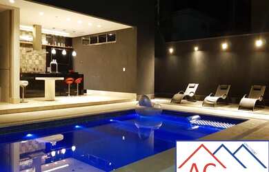 Imagem: A casa possui 4 Dormitórios, 4 Suítes, 2 Banheiros, 2 Vagas