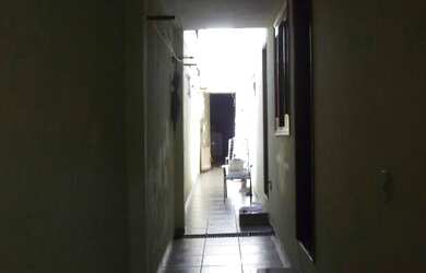 Imagem: A casa possui 4 Dormitórios, 2 Banheiros, 2 Vagas na garagem