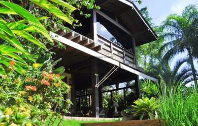 Imagem: A casa em condomínio possui 4 Dormitórios, 4 Suítes, 5 Vagas