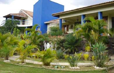 Imagem: A casa em condomínio à venda possui 3 Dormitórios, 3 Suítes