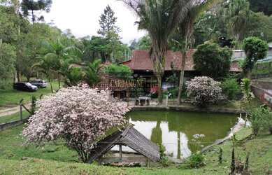 Imagem: A chácara possui 5 Dormitórios, 5 Banheiros, 10 Vagas na garagem