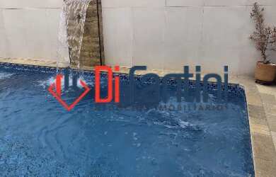 Imagem: A casa possui 3 Dormitórios, 1 Suíte, 2 Banheiros, 5 Vagas