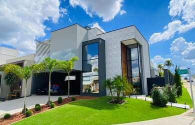 Imagem: A casa em condomínio possui 5 Dormitórios, 4 Suítes, 6 Banheiros