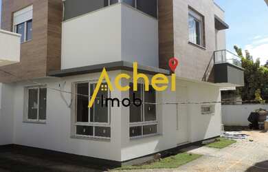 Imagem: A casa em condomínio possui 3 Dormitórios, 3 Suítes, 4 Banheiros