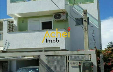 Imagem: A casa possui 2 Dormitórios, 2 Suítes, 3 Banheiros, 2 Vagas