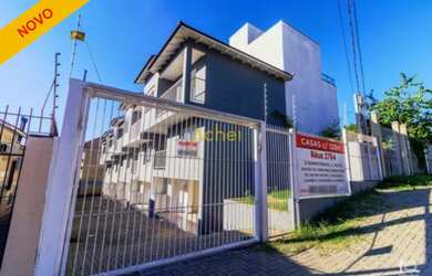 Imagem: A casa em condomínio possui 2 Dormitórios, 1 Suíte, 3 Banheiros