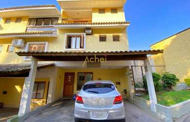 Imagem: A casa em condomínio possui 3 Dormitórios, 1 Suíte, 3 Banheiros