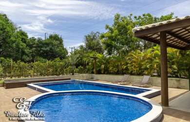 Imagem: A casa em condomínio possui 5 Dormitórios, 5 Suítes, 5 Banheiros