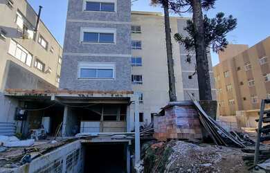 Imagem: O apartamento possui 2 Dormitórios, 1 Suíte, 2 Banheiros