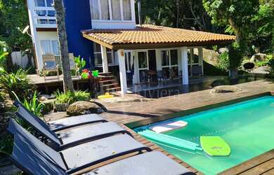 Imagem: A casa em condomínio possui 5 Dormitórios, 3 Suítes, 4 Banheiros