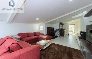 Imagem: A casa possui 3 Dormitórios, 3 Suítes, 6 Banheiros, 4 Vagas