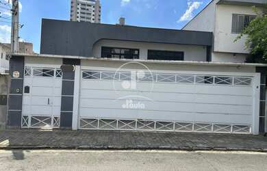 Imagem: A casa possui 3 Dormitórios, 7 Banheiros, 3 Vagas na garagem