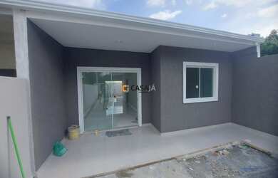 Imagem: A casa possui 2 Dormitórios, 1 Suíte, 1 Banheiro, 2 Vagas