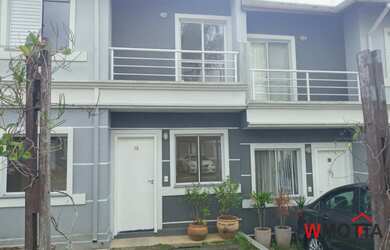 Imagem: A casa e possui 3 Dormitórios, 1 Suíte, 3 Banheiros, 2 Vagas