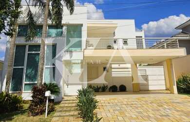 Imagem: A casa em condomínio possui 4 Dormitórios, 4 Suítes, 7 Banheiros