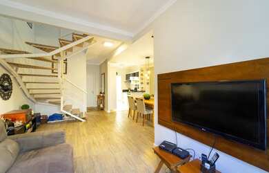 Imagem: A casa em condomínio possui 3 Dormitórios, 1 Suíte, 3 Banheiros