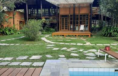 Imagem: A chácara possui 5 Dormitórios, 5 Banheiros, 10 Vagas na garagem