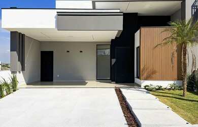 Imagem: A casa em condomínio possui 3 Dormitórios, 3 Suítes, 4 Banheiros