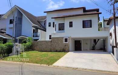 Imagem: A casa em condomínio possui 4 Dormitórios, 2 Suítes, 4 Banheiros