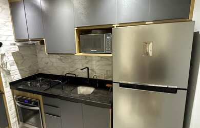 Imagem: O apartamento possui 2 Dormitórios, 1 Banheiro, 2 Vagas na