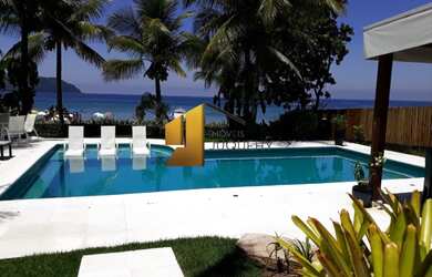 Imagem: A casa possui 5 Dormitórios, 8 Suítes, 7 Banheiros, 8 Vagas