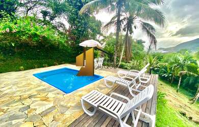 Imagem: A casa possui 3 Dormitórios, 2 Suítes, 4 Banheiros, 3 Vagas