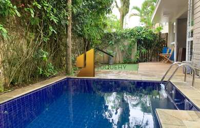 Imagem: A casa em condomínio possui 5 Dormitórios, 5 Suítes, 7 Banheiros