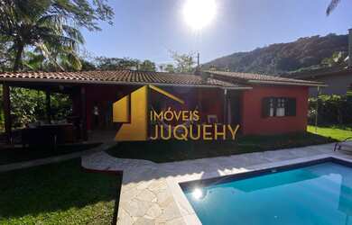 Imagem: A casa em condomínio possui 3 Dormitórios, 3 Suítes, 4 Banheiros