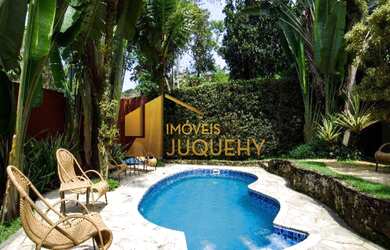 Imagem: A casa possui 3 Dormitórios, 2 Suítes, 4 Banheiros, 2 Vagas