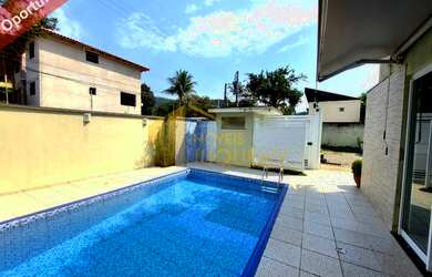 Imagem: A casa em condomínio possui 3 Dormitórios, 3 Suítes, 3 Banheiros