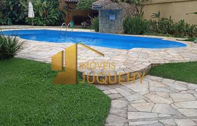 Imagem: A casa em condomínio possui 3 Dormitórios, 1 Suíte, 3 Banheiros