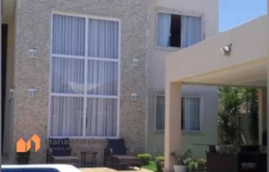 Imagem: A casa possui 5 Dormitórios, 5 Suítes, 8 Banheiros, 2 Vagas