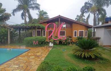 Imagem: A chácara possui 3 Dormitórios, 1 Suíte, 1.092m² de Área