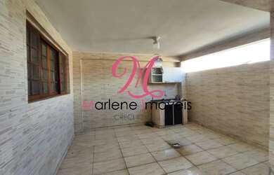 Imagem: A casa possui 2 Dormitórios, 2 Vagas na garagem e 125m² de