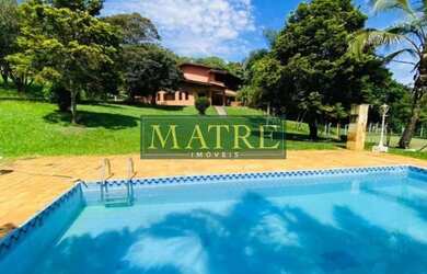 Imagem: A chácara possui 5 Dormitórios, 5 Suítes, 3 Banheiros, 10