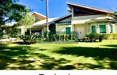 Imagem: A casa em condomínio à venda possui 4 Dormitórios, 4 Suítes