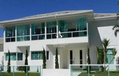 Imagem: A casa em condomínio possui 4 Dormitórios, 4 Suítes, 5 Banheiros