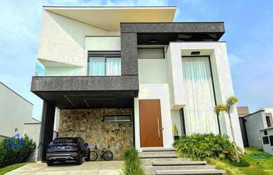 Imagem: A casa em condomínio possui 3 Dormitórios, 3 Suítes, 5 Banheiros