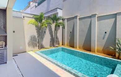 Imagem: A casa em condomínio possui 4 Dormitórios, 4 Suítes, 4 Vagas