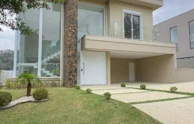 Imagem: A casa em condomínio possui 4 Dormitórios, 4 Suítes, 6 Banheiros