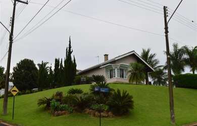 Imagem: A casa em condomínio possui 3 Dormitórios, 1 Suíte, 3 Banheiros